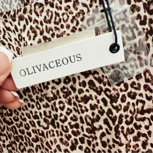 Olivaceous Tan and Black Sheath Dress with Bishop Sleeves Size Medium NWT - Picture 8 of 16